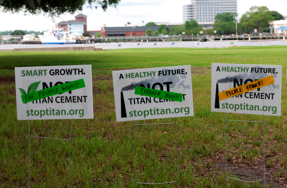 Signs celebrate the victory against Titan Cement
