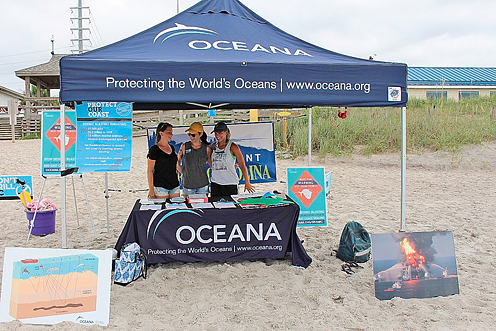 Lumina News photo by Katie Dickens. Volunteers from Oceana plus Surfrider Foundation and Environment North Carolina toured area Atlantic beaches to garner more public opposition to seismic blasting and testing off the east coast.